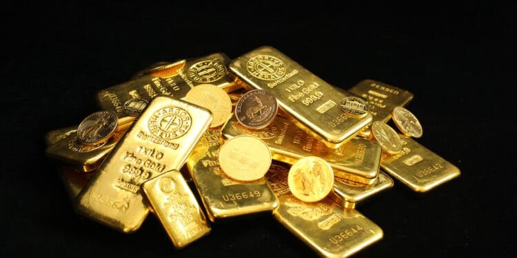 Pile of gold bullion coins and bars. Argor Heraeus, Münze Österreich, Royal Canadian Mint, U.S. Mint, Australian Mint of Perth, panda and Krugerrand. If you use our photos, please add credit to https://zlataky.cz, when possible