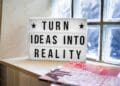 Turn Ideas into Reality! A motivational sign in a Co-Working Space.