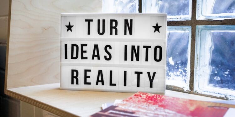 Turn Ideas into Reality! A motivational sign in a Co-Working Space.