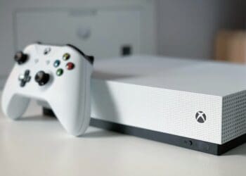 white xbox one console on white table