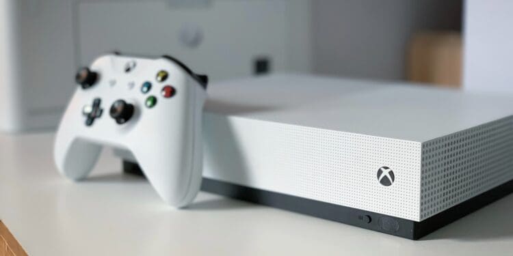 white xbox one console on white table