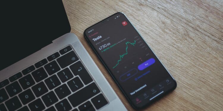 black android smartphone on macbook pro