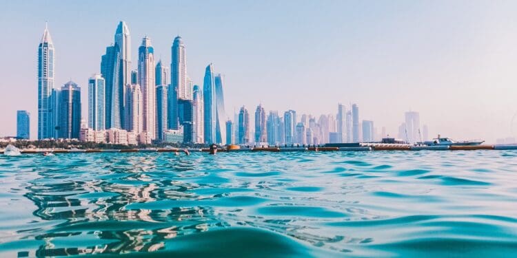 city skyline under blue sky during daytime