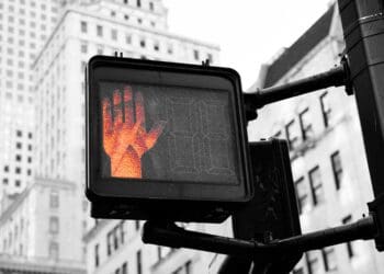 closeup photo of street go and stop signage displaying stop