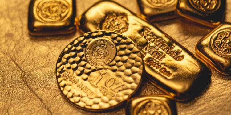 Collection of original gold bars and coin minted by Scottsdale Mint in Arizona.