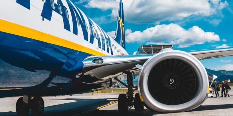 photo of blue and white passenger plane turbine