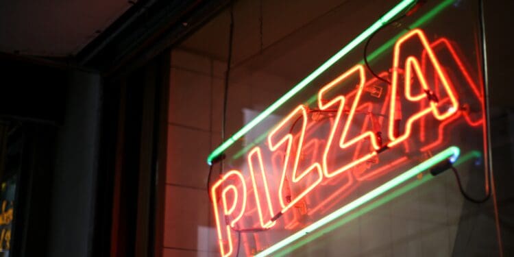 shallow focus photo of lighted pizza neon light signage
