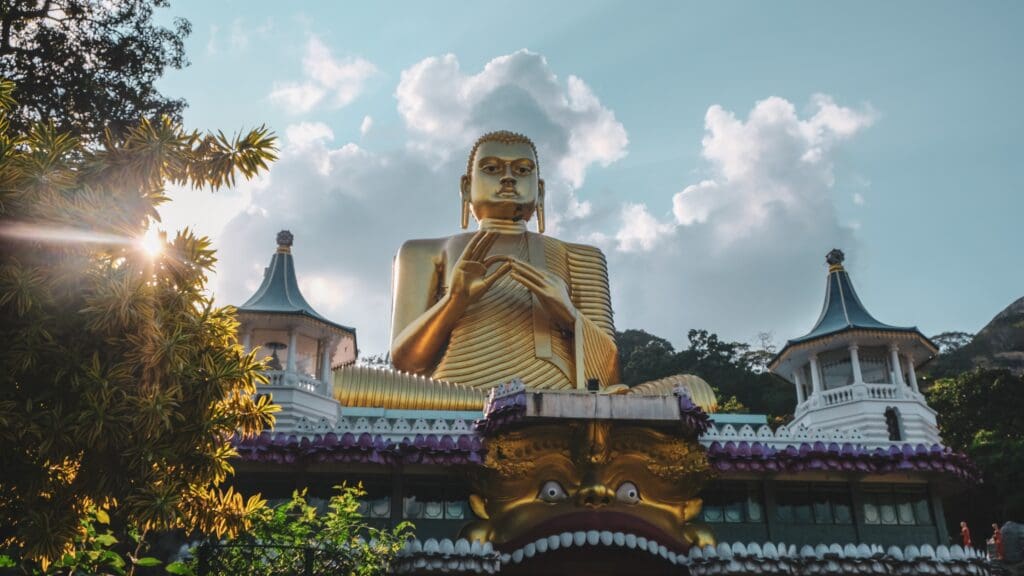 Sunset on gold buddha #wallpaper #wallpapers #srilanka #buddha #background #sky #temple #history #srilanka #tree #ray #cloud