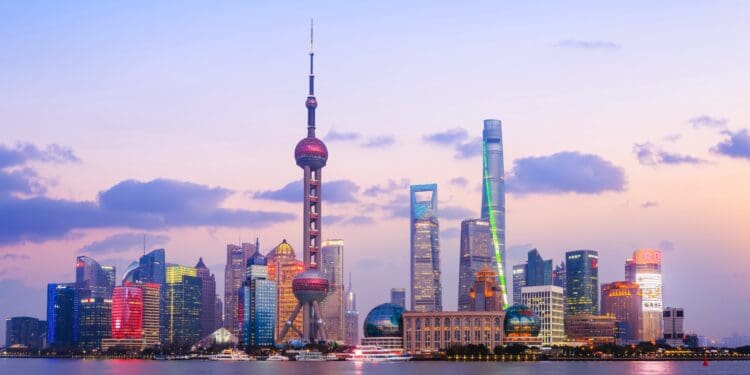 The photo was taken at the Monument to the People’s Heroes, Shanghai bund.