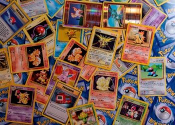 A bunch of Pokémon Trading Cards with Zapdos, Ninetales, Porygon, Cyndaquil, Ponyta, Machop, Vulpix and many more.