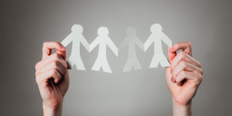 Hands holding a paper chain