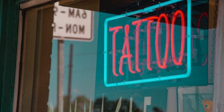 lighted red and green Tattoo neon signage