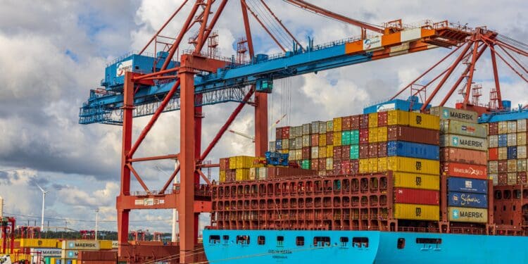 Our goods travel around the world in containers. Picture of a container ship in the port of Hamburg (Germany)