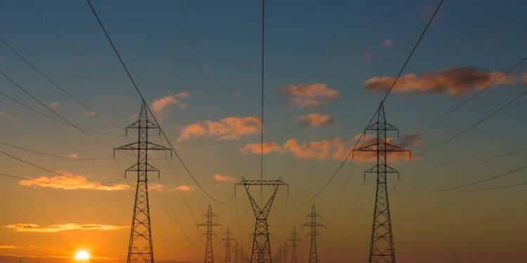 Power pylons at sunset