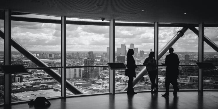 meeting near a transparent glass
