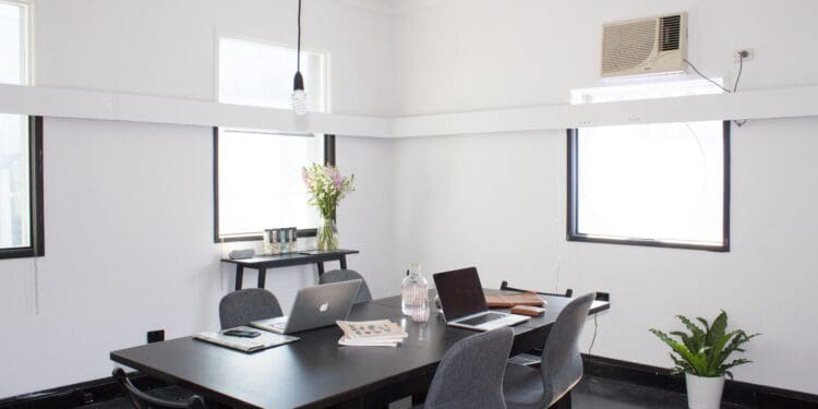 rectangular brown wooden table with chairs