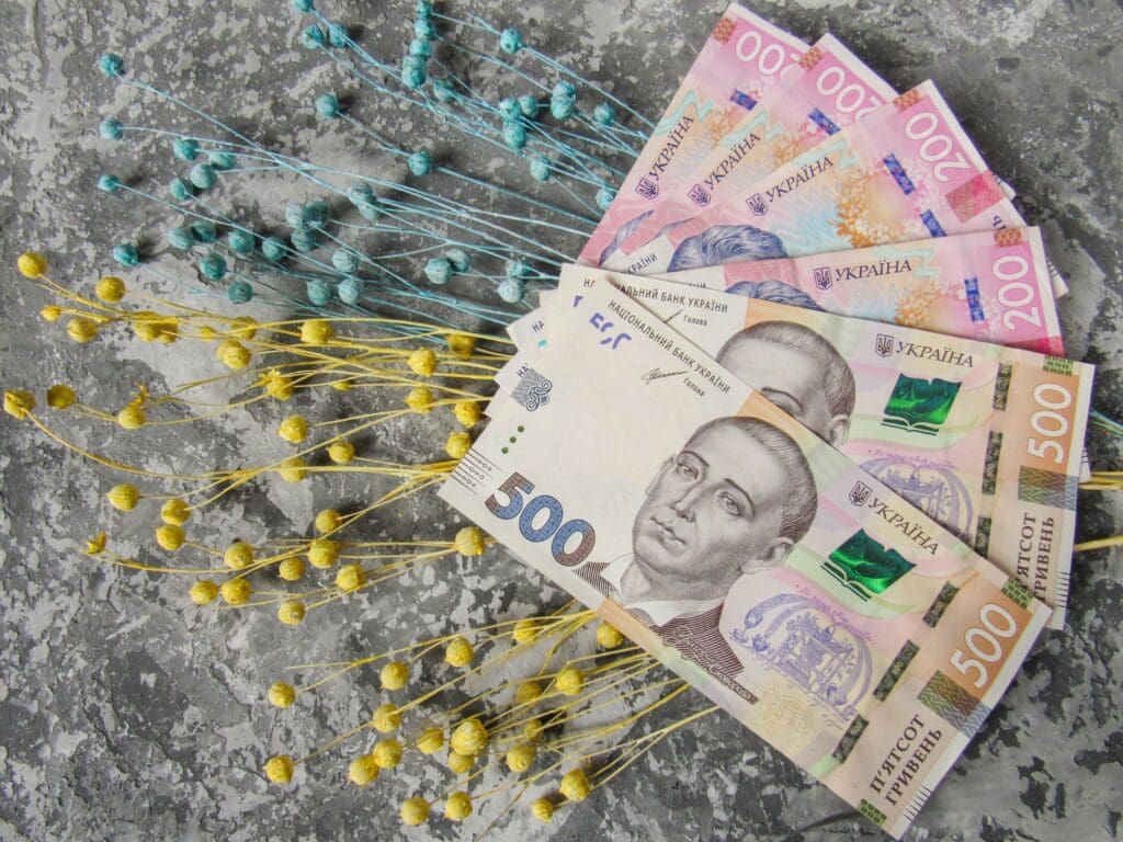 Ukrainian hryvnia money on a gray background