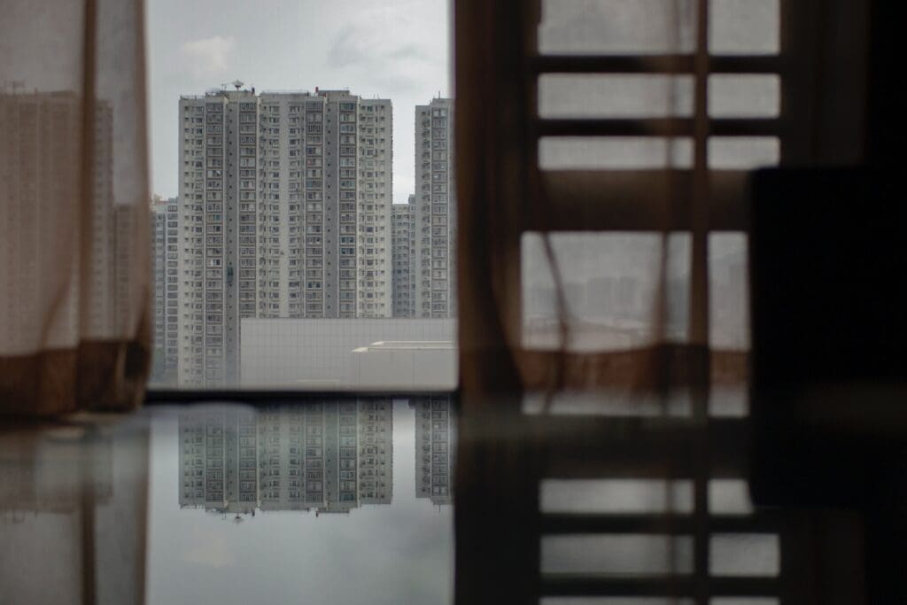 high rise buildings near body of water during daytime