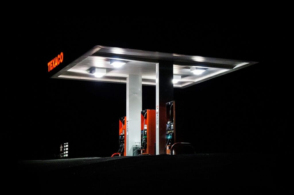 This shot was taken during a roadtrip through the US. While we were staying at the Yosemite Lakes Lodge near the National Park the nights became incredibly dark and serene. Near the California State Route 120 there was simply nothing but this lit Texaco gas station surrounded by utter darkness.