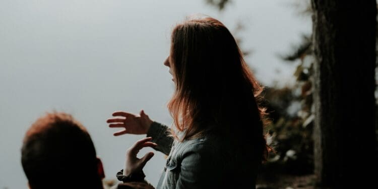 woman wearing gray jacket