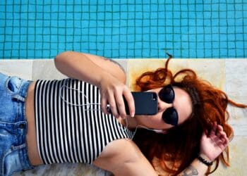 Woman with iPhone at Sao Paulo