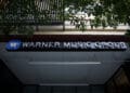 Warner Music Group Inc. signage is displayed outside the company's headquarters in the Arts District neighborhood of Los Angeles, California, U.S., on Wednesday, June 3, 2020. Warner Music Group's shareholders have raised $1.93 billion in an upsized initial public offering that ranks as one of the biggest U.S. listing this year. Photographer: Patrick T. Fallon/Bloomberg via Getty Images