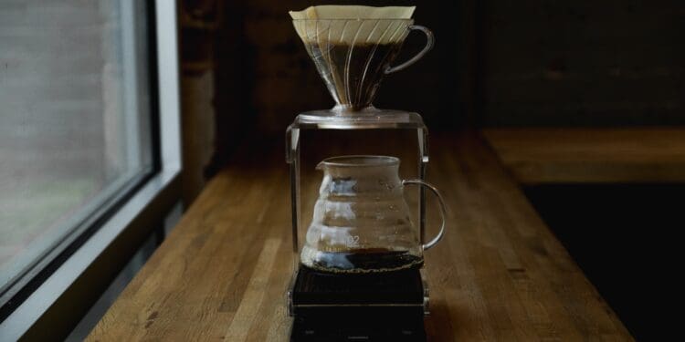 coffee pitcher on table near window