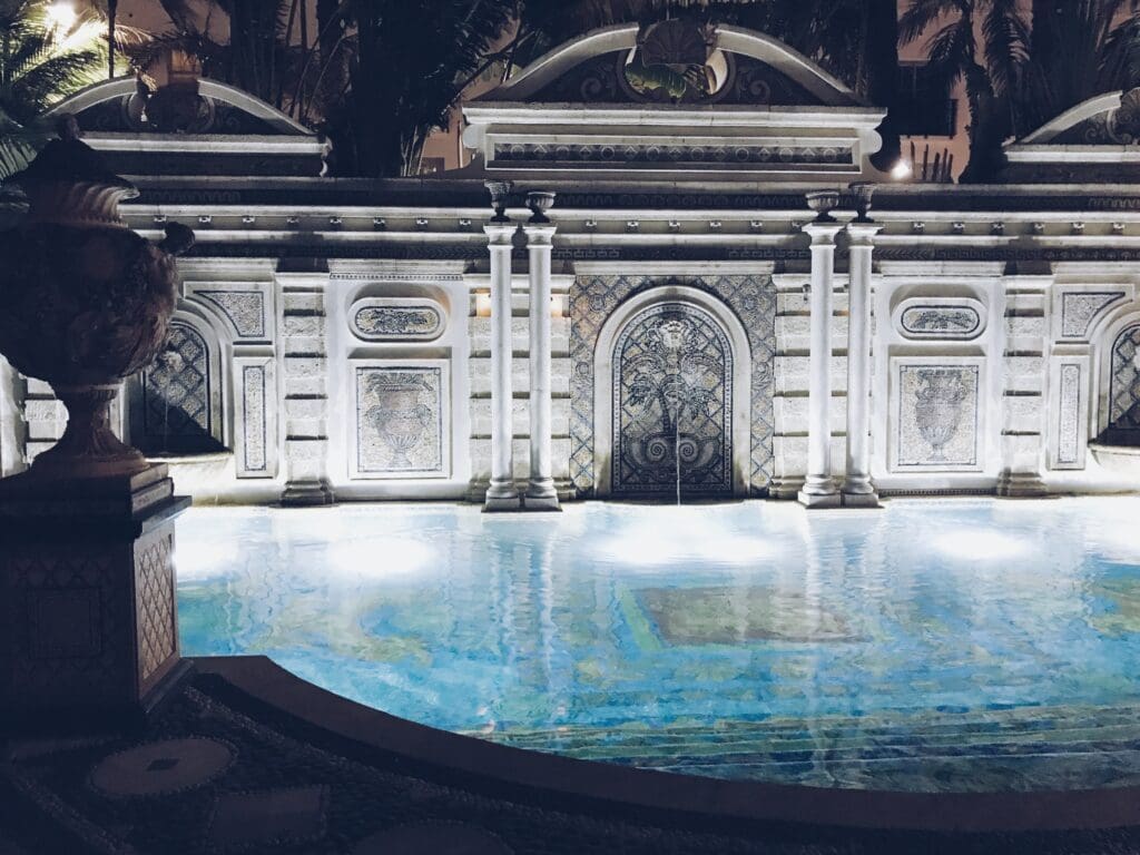 Poolside at the Versace Mansion in Miami Beach, FL