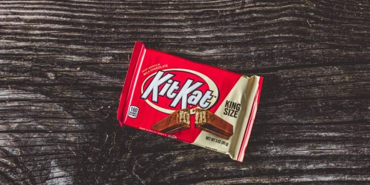 Red and White KitKat top-down on a wooden table