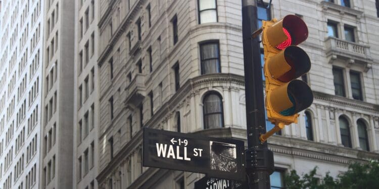 Wall St and Broadway signs