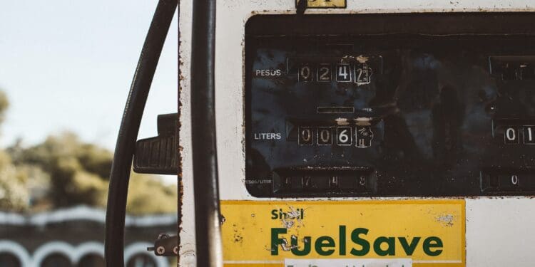 automotive fuel pump reading at 242 pesos