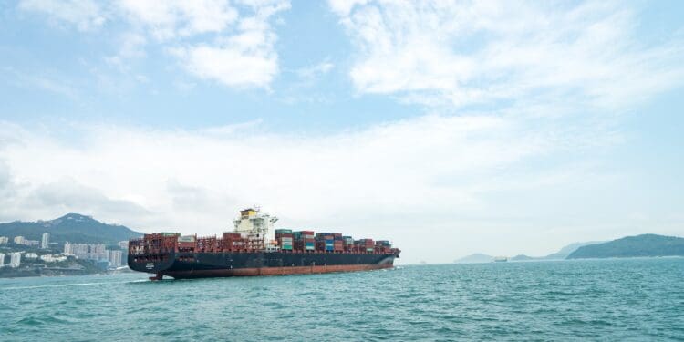 cargo vessel on body of water
