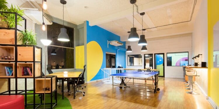 Startup office with a ping-pong table and desk