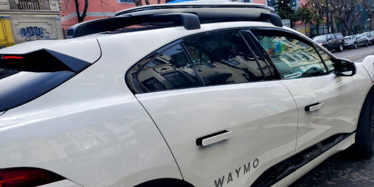 FILE PHOTO: A Waymo rider-only robotaxi is seen during a test ride in San Francisco, California, U.S., December 9, 2022. REUTERS/Paresh Dave