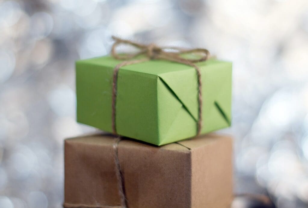 Gift boxes on foil background