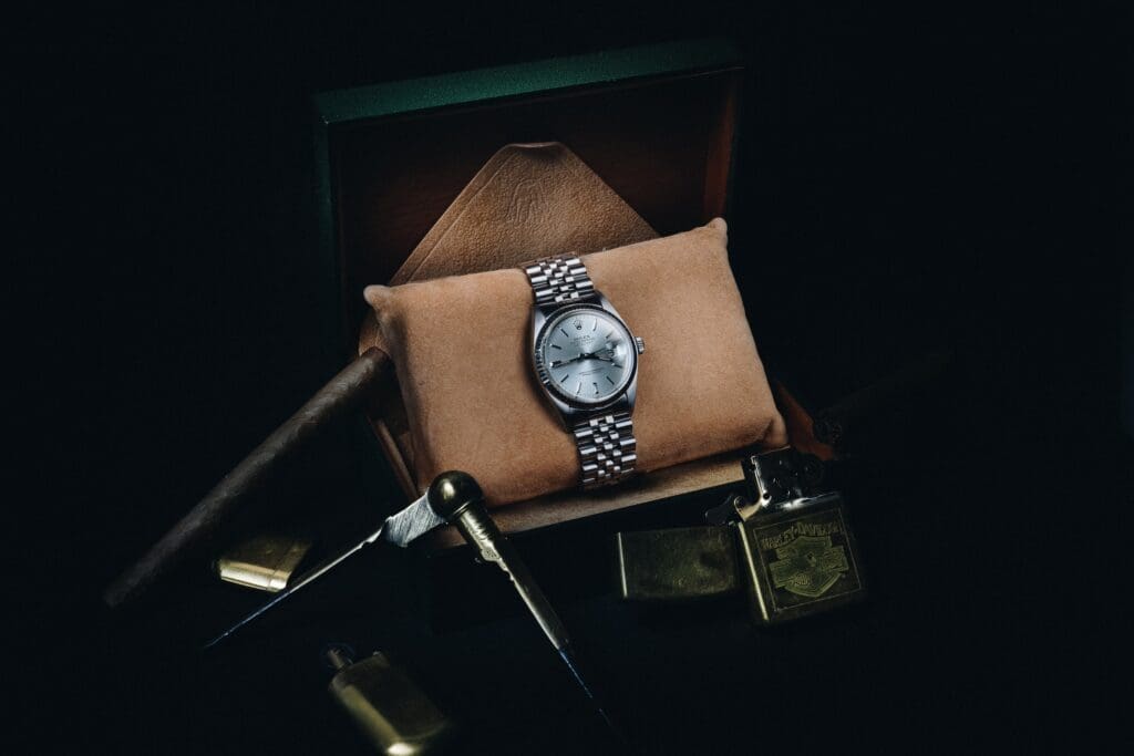 silver and black chronograph watch
