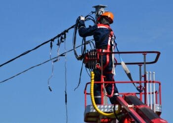 Electrician is repairing the wires