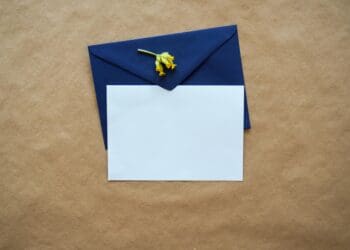 Top View / Mock up Card Template with Envelope & Flower - Displayed on Craft Paper