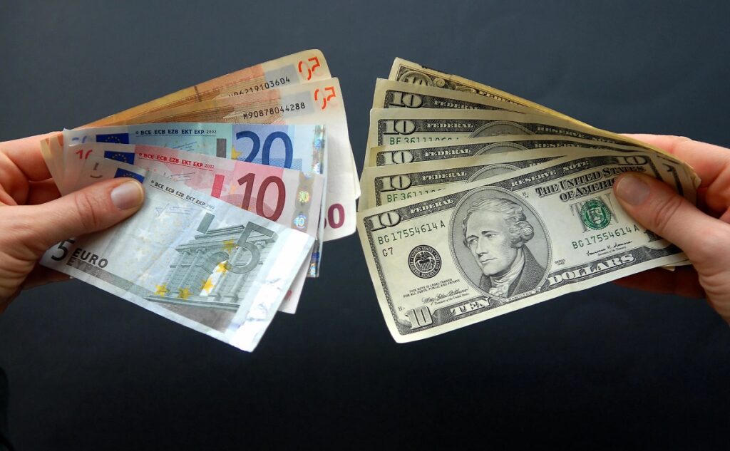 FILE PHOTO: A 3D-printed oil pump jack is placed on dollar banknotes in this illustration picture, April 14, 2020. REUTERS/Dado Ruvic/Illustration