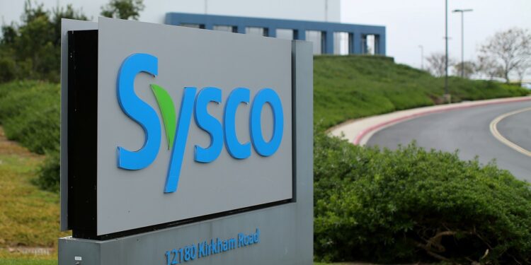 FILE PHOTO: A Sysco sign is shown outside one of their distribution centers in Poway, California, U.S. February 6, 2017.  REUTERS/Mike Blake