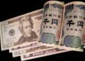 FILE PHOTO: Banknotes of Japanese yen and U.S. dollar are seen in this illustration picture taken September 23, 2022. REUTERS/Florence Lo/File Photo