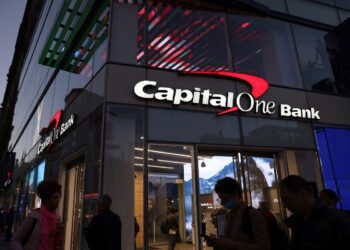 FILE PHOTO: Signage is seen outside a Capital One Bank in Manhattan, New York, U.S., November 12, 2021. REUTERS/Andrew Kelly/File Photo