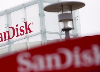 A logo sign outside the headquarters of the SanDisk Corporation, in Milpitas, California on December 7, 2014. Photo Credit: Kristoffer Tripplaar/ Sipa USA *** Please Use Credit from Credit Field *** (Newscom TagID: sipaphotosfive123936.jpg) [Photo via Newscom]