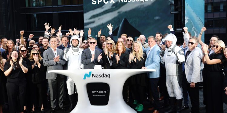 Bret Johnsen, chief financial officer of Space Exploration Technologies Corp. (SpaceX), center left, Gwynne Shotwell, president of Space Exploration Technologies Corp. (SpaceX), center, and Adena Friedman, chief executive officer of Nasdaq Inc.,  during the closing bell ceremony at the Nasdaq MarketSite in New York, US, on Friday, June 12, 2026. Shares of SpaceX climbed in their first day of trading on Friday following a $75 billion IPO that smashed records and instantly turned the crown jewel of Elon Musk's business empire into one of the most-valuable public companies in the world. Photographer: Michael Nagle/Bloomberg via Getty Images